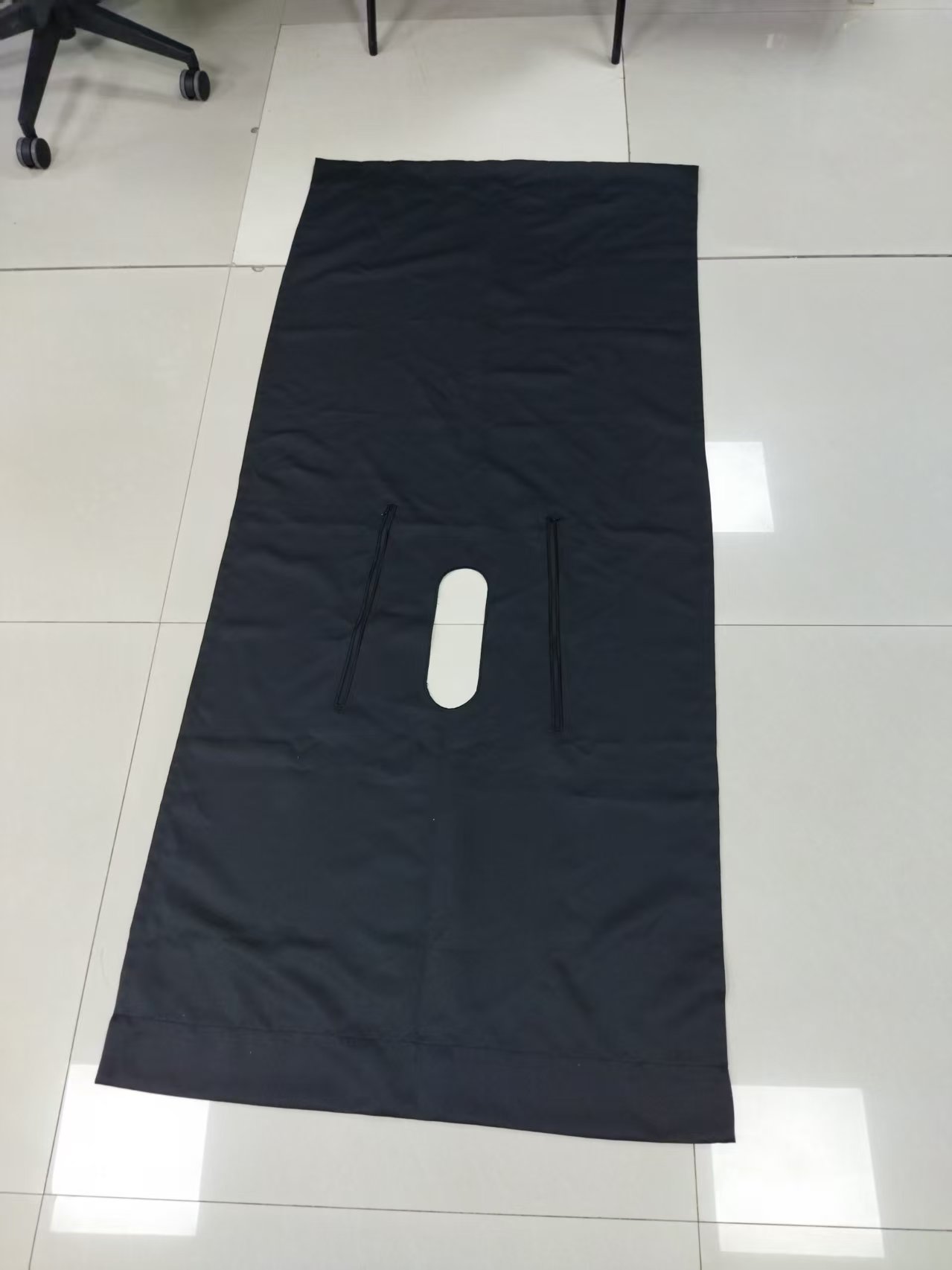 Fabric panel with oval opening cut out