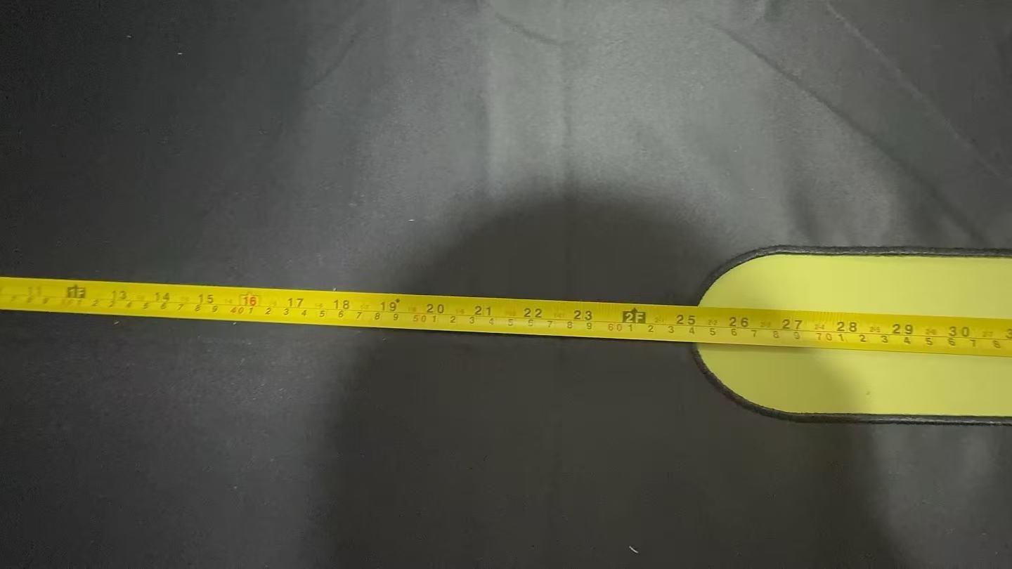 Measuring tape showing oval opening width