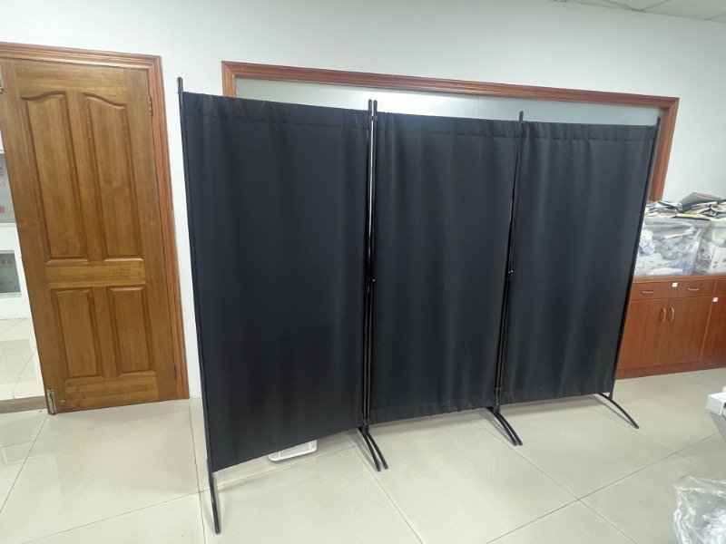 Fabric panels being assembled in a workshop